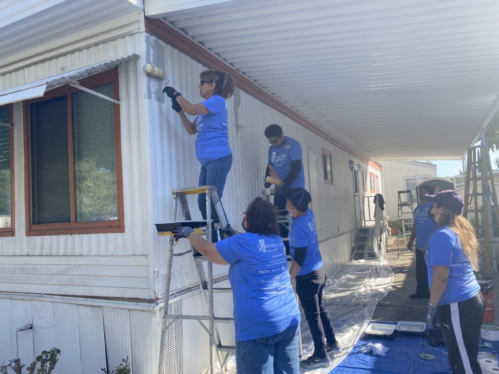 Members of the Vietnamese National Association of Real Estate Professionals volunteered on Black April to fix up a home in East San Jose. Photo by Tran Nguyen.